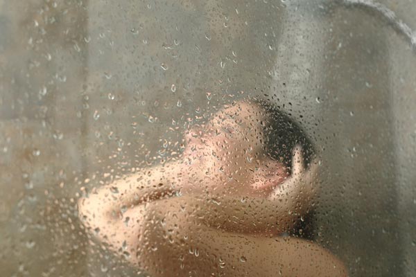Hot shower bath for restless leg